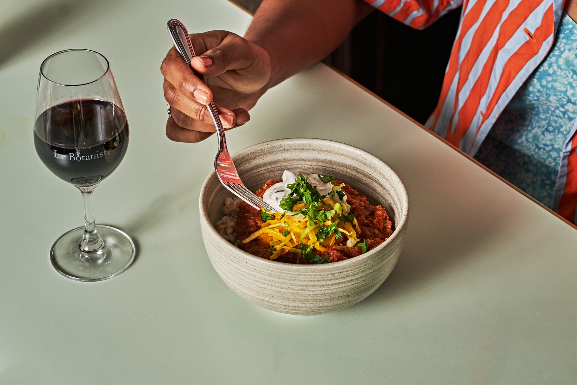 Le Botaniste chili bowl with red wine